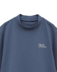 トラヴィスマシューのハイネックシャツ