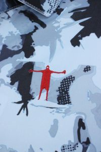 ティーマックのポロシャツ