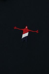 ティーマックのポロシャツ