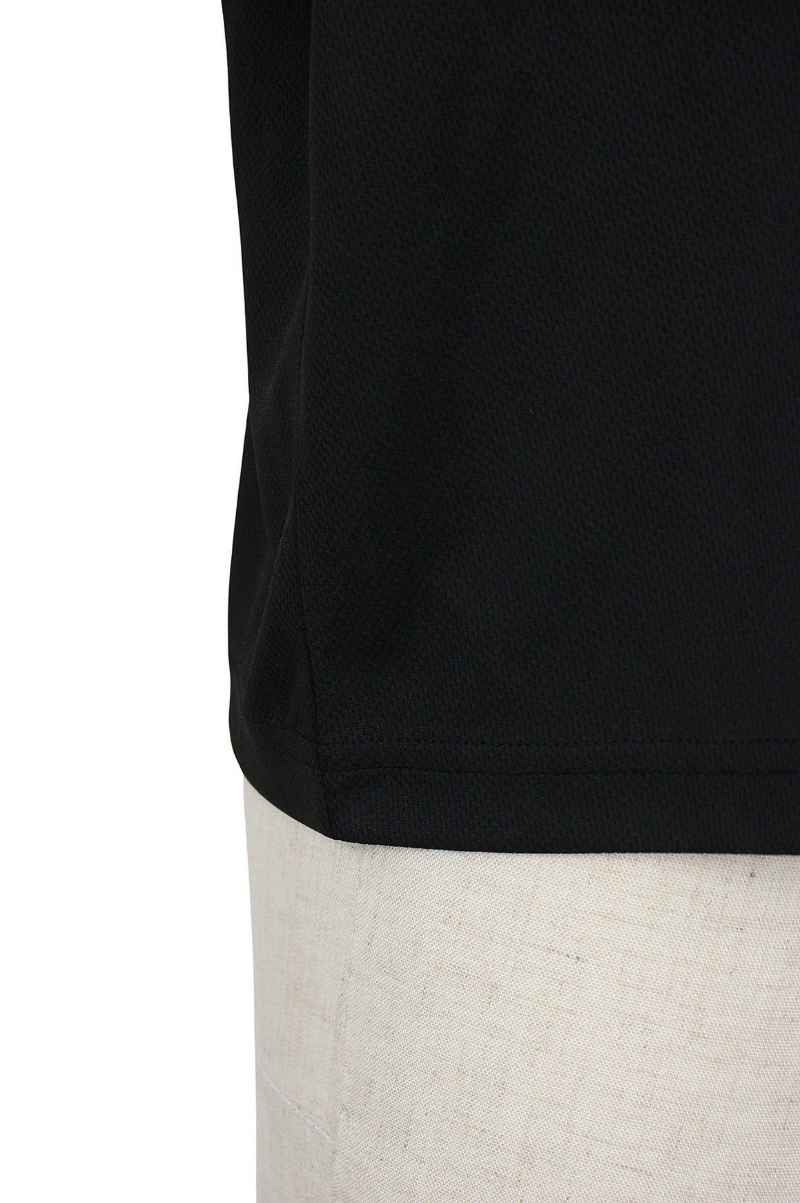 セシルマクビーグリーンのポロシャツ