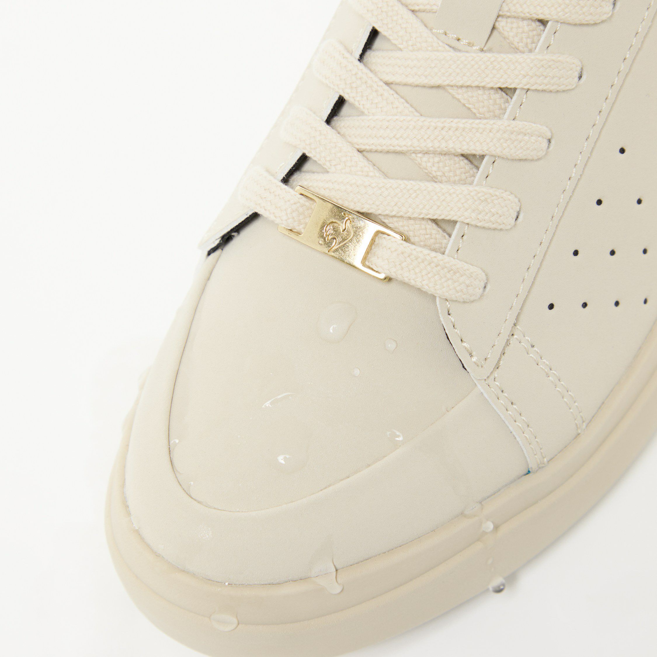 ルコックスポルティフのシューズ