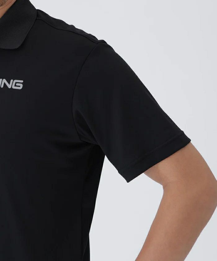 ピンのポロシャツ