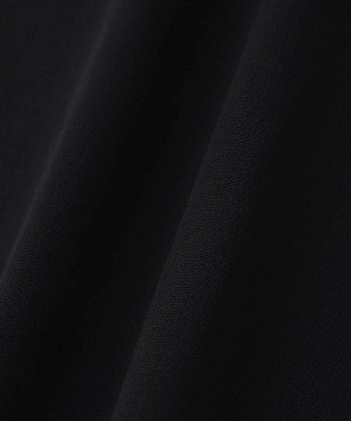 ピンのポロシャツ