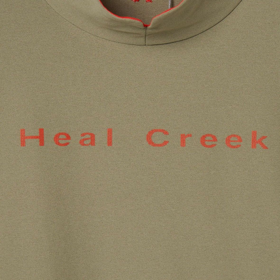 ヒールクリークのハイネックシャツ