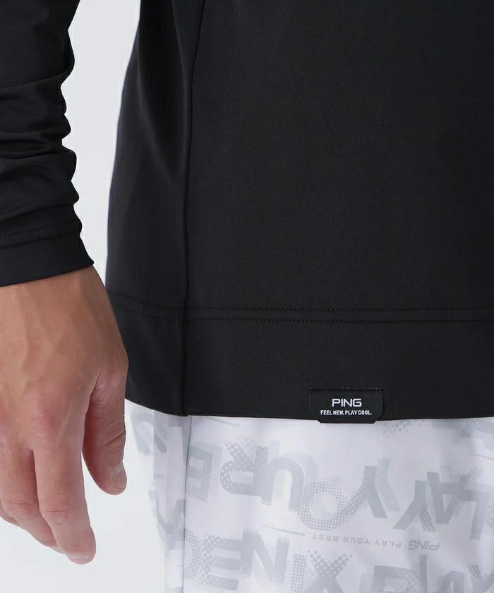 ピンのポロシャツ