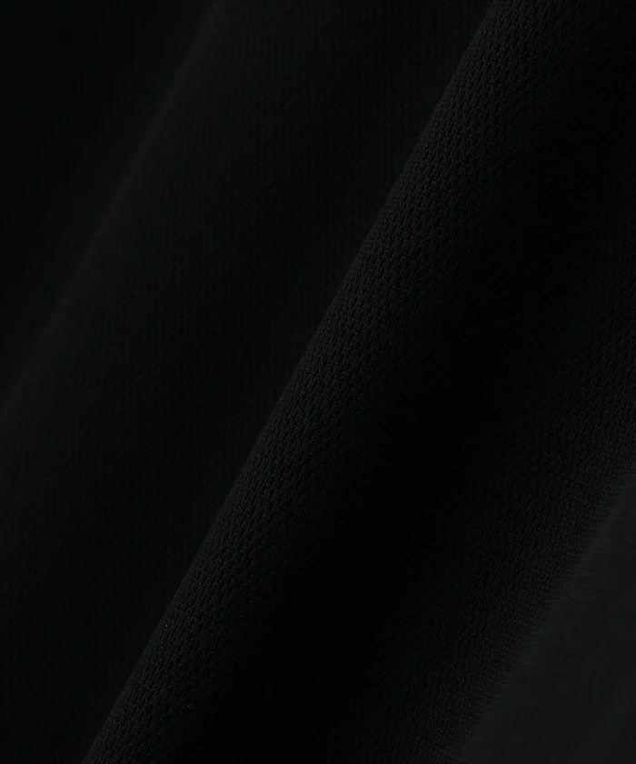 ピンのポロシャツ