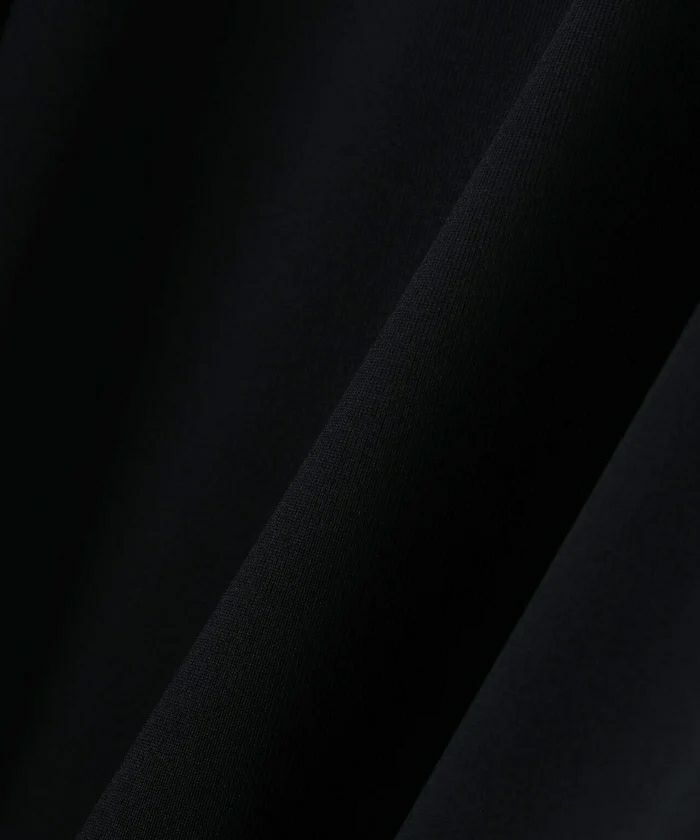 ピンのポロシャツ