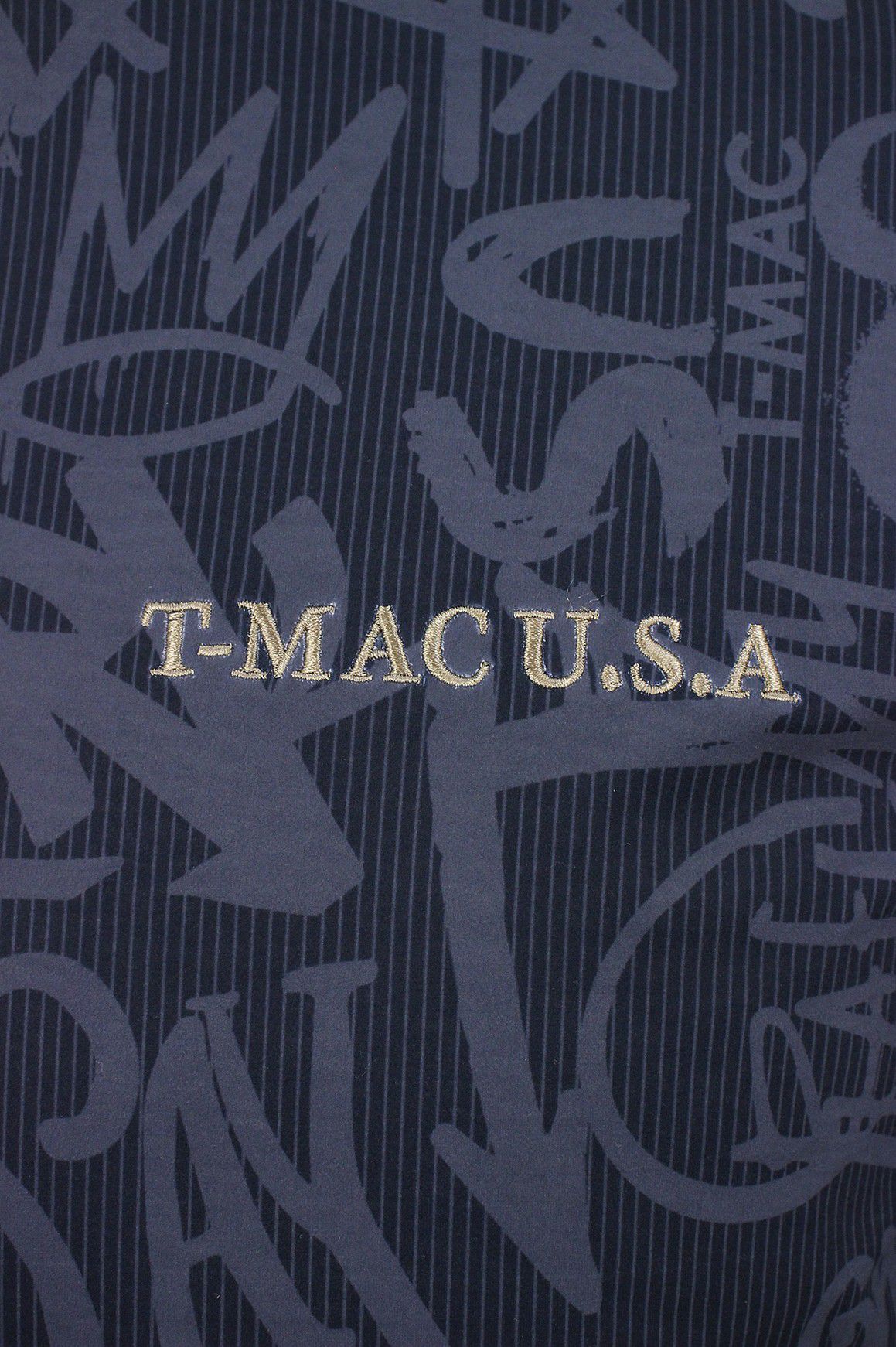 ティーマックのハイネックシャツ