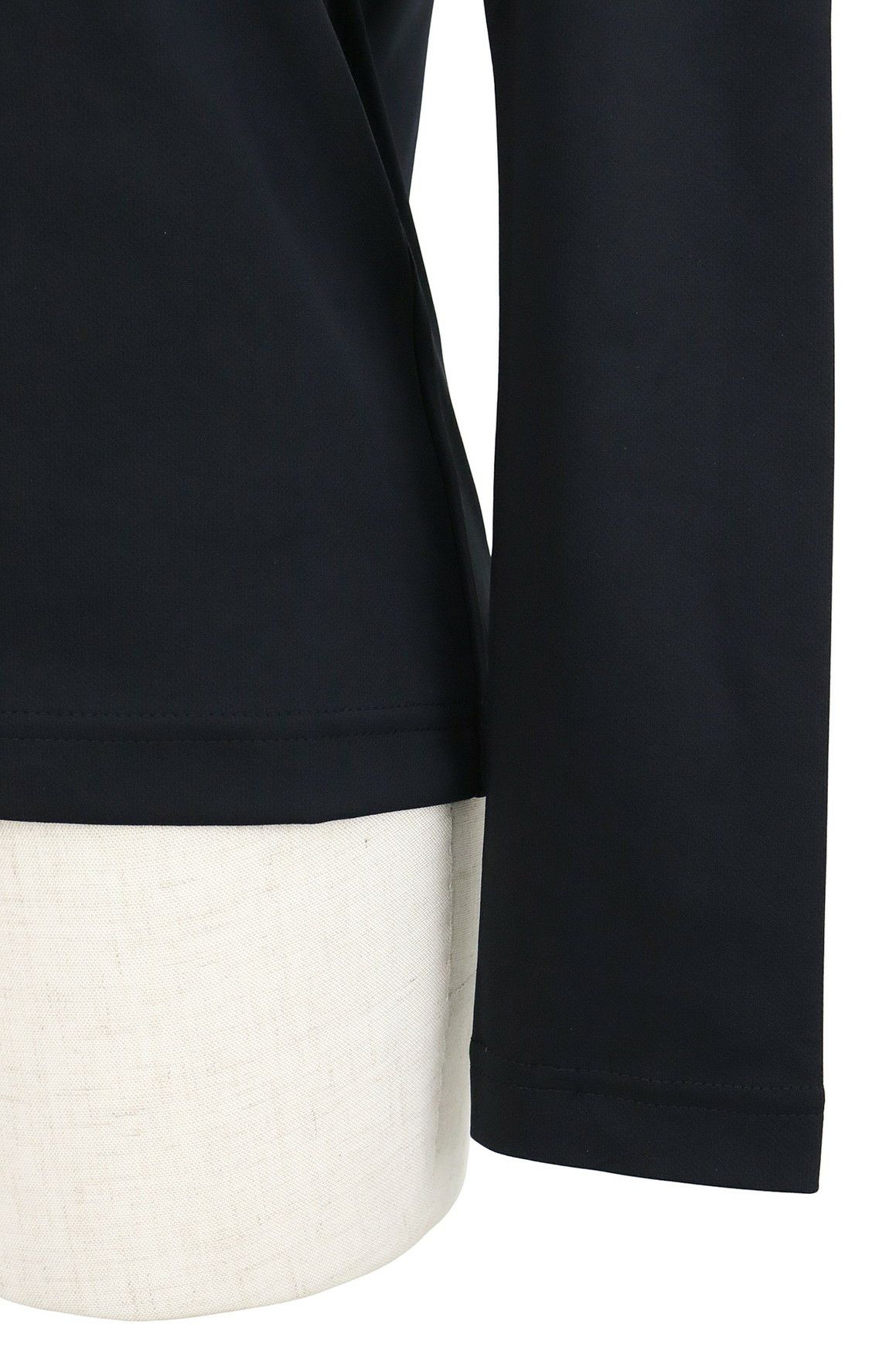 ニューバランスゴルフのハイネックシャツ