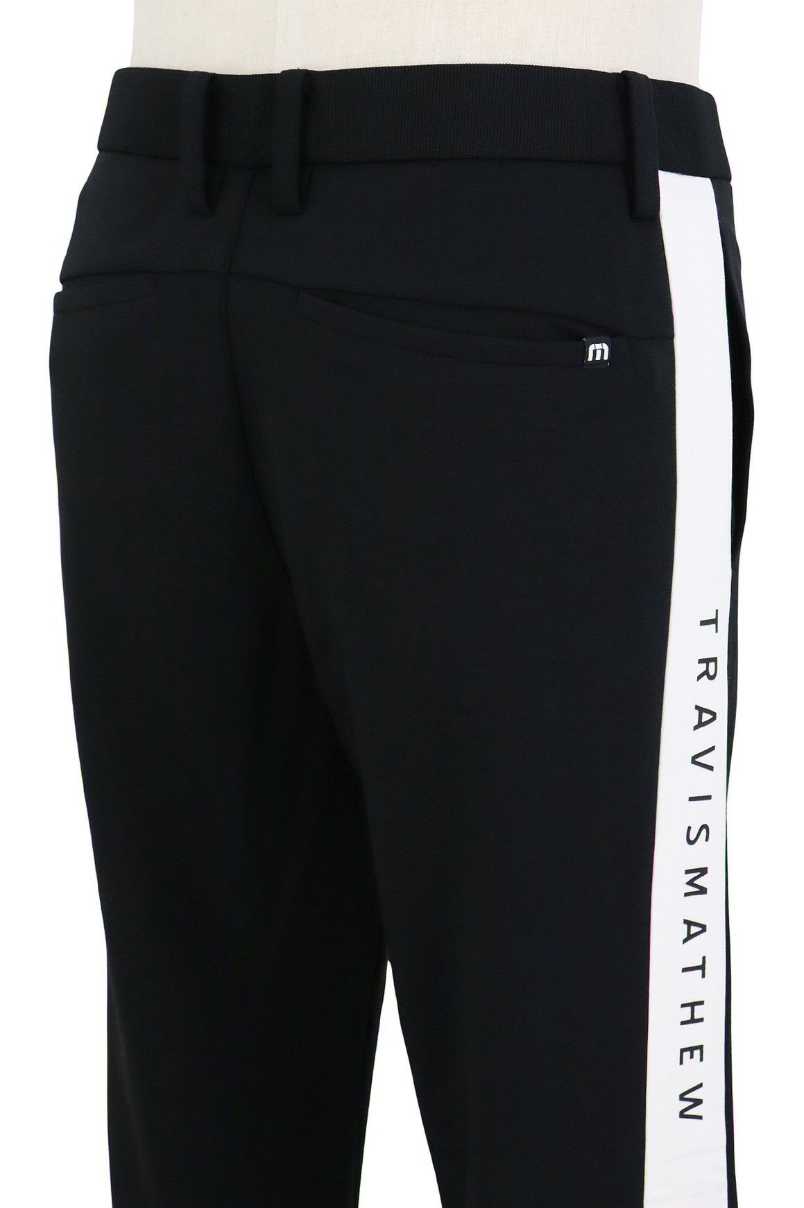 トラヴィスマシューのロングパンツ