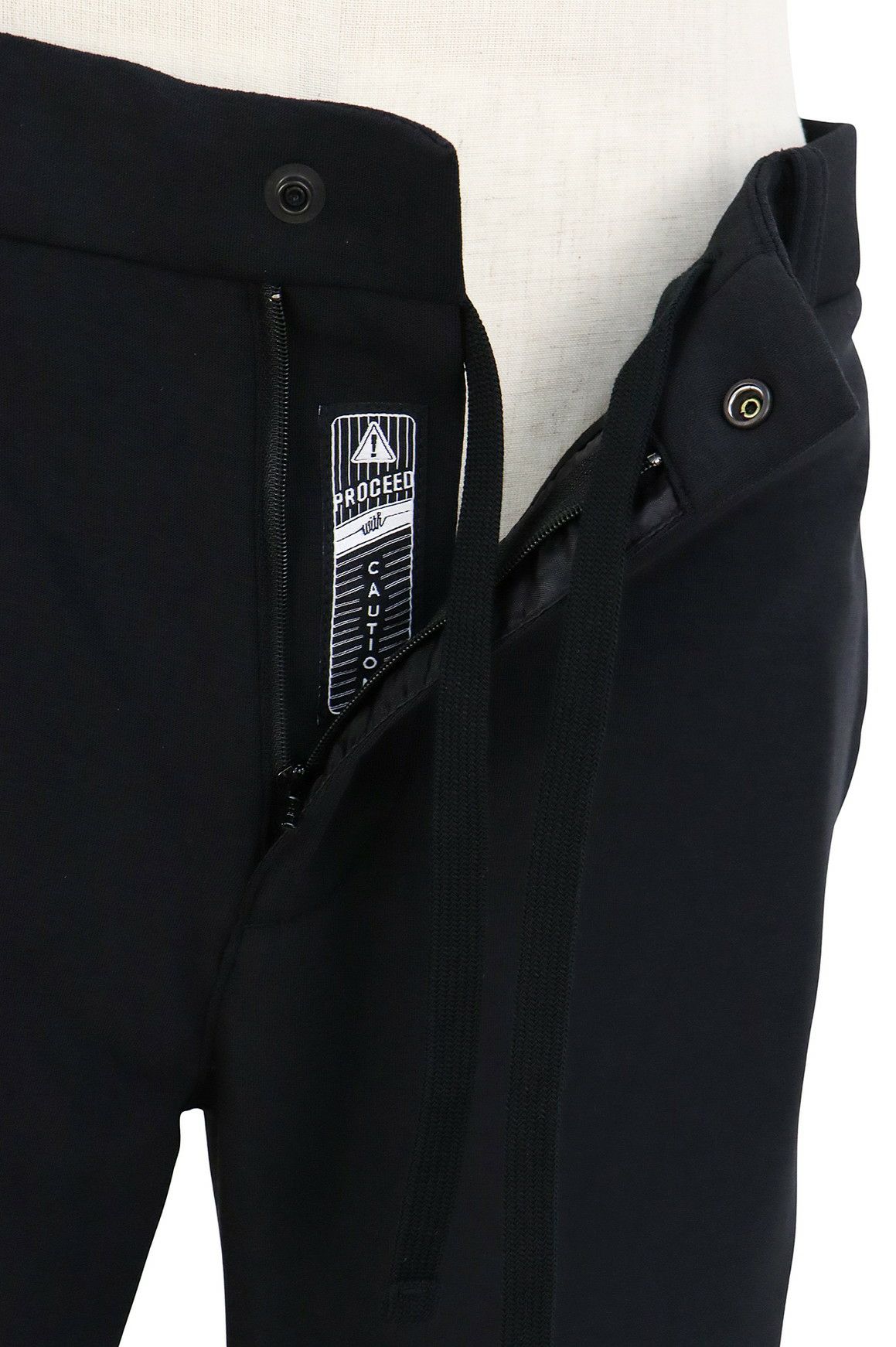 トラヴィスマシューのロングパンツ