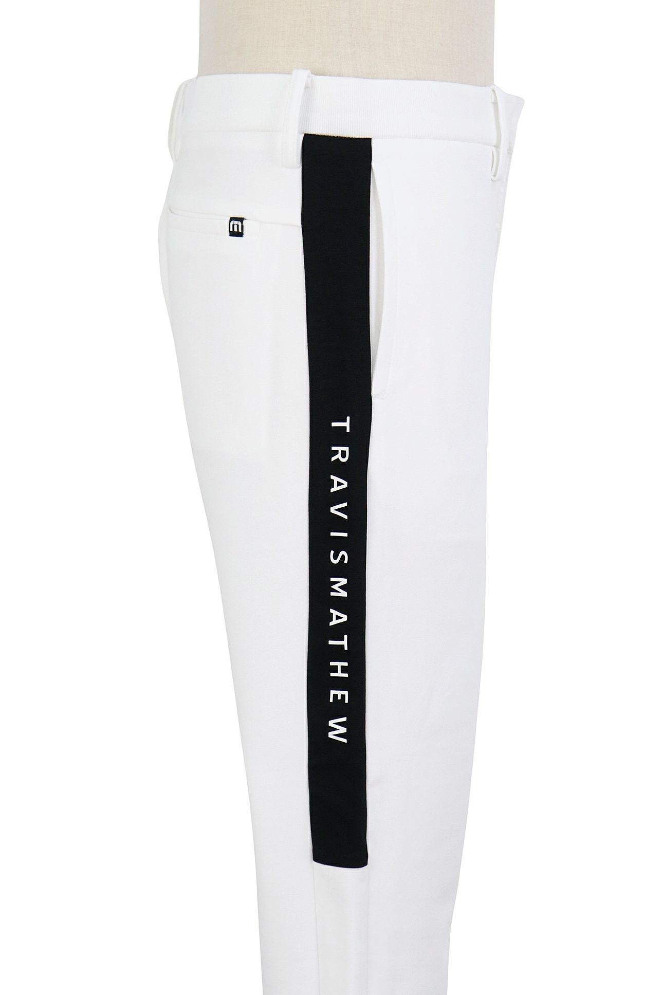 トラヴィスマシューのロングパンツ