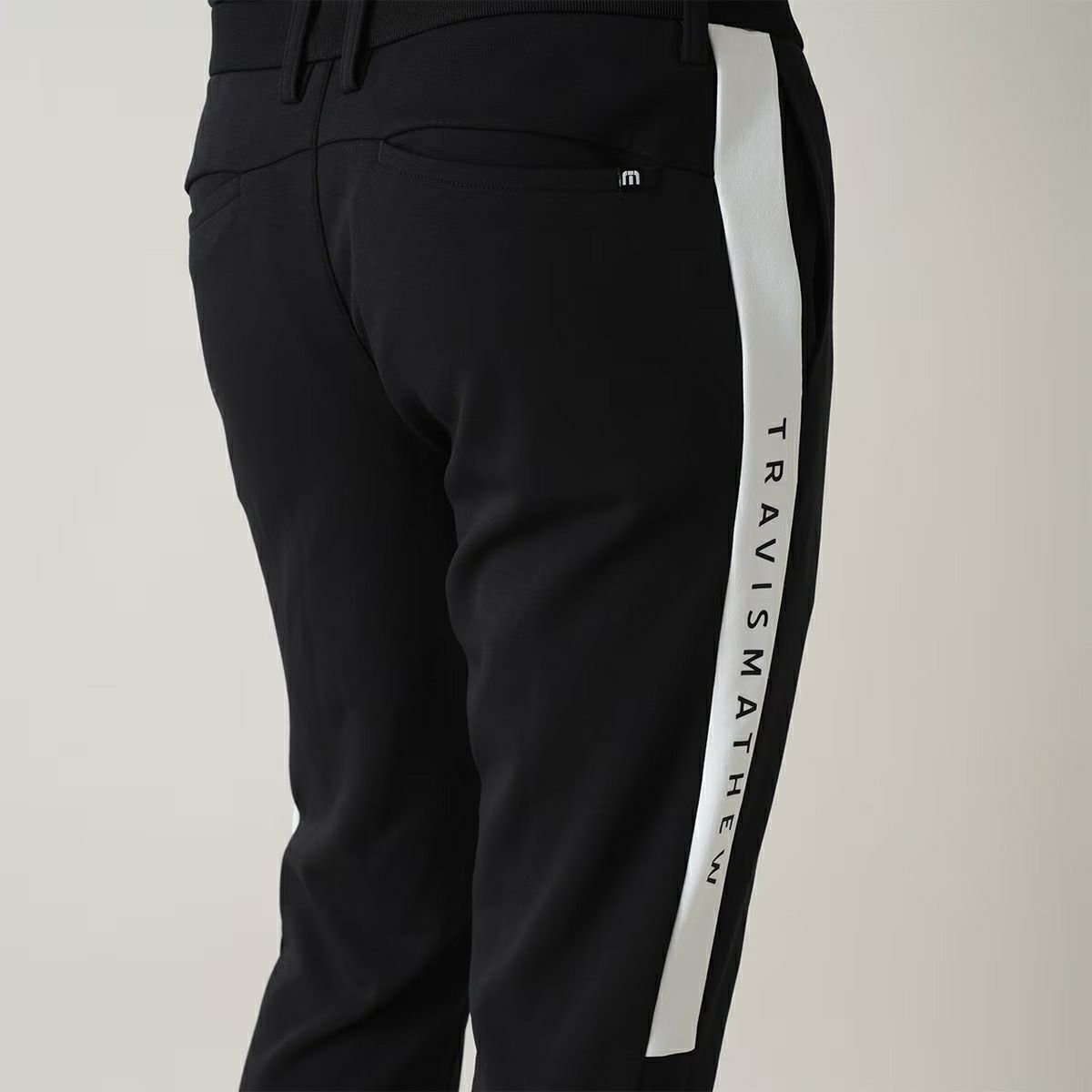 トラヴィスマシューのロングパンツ