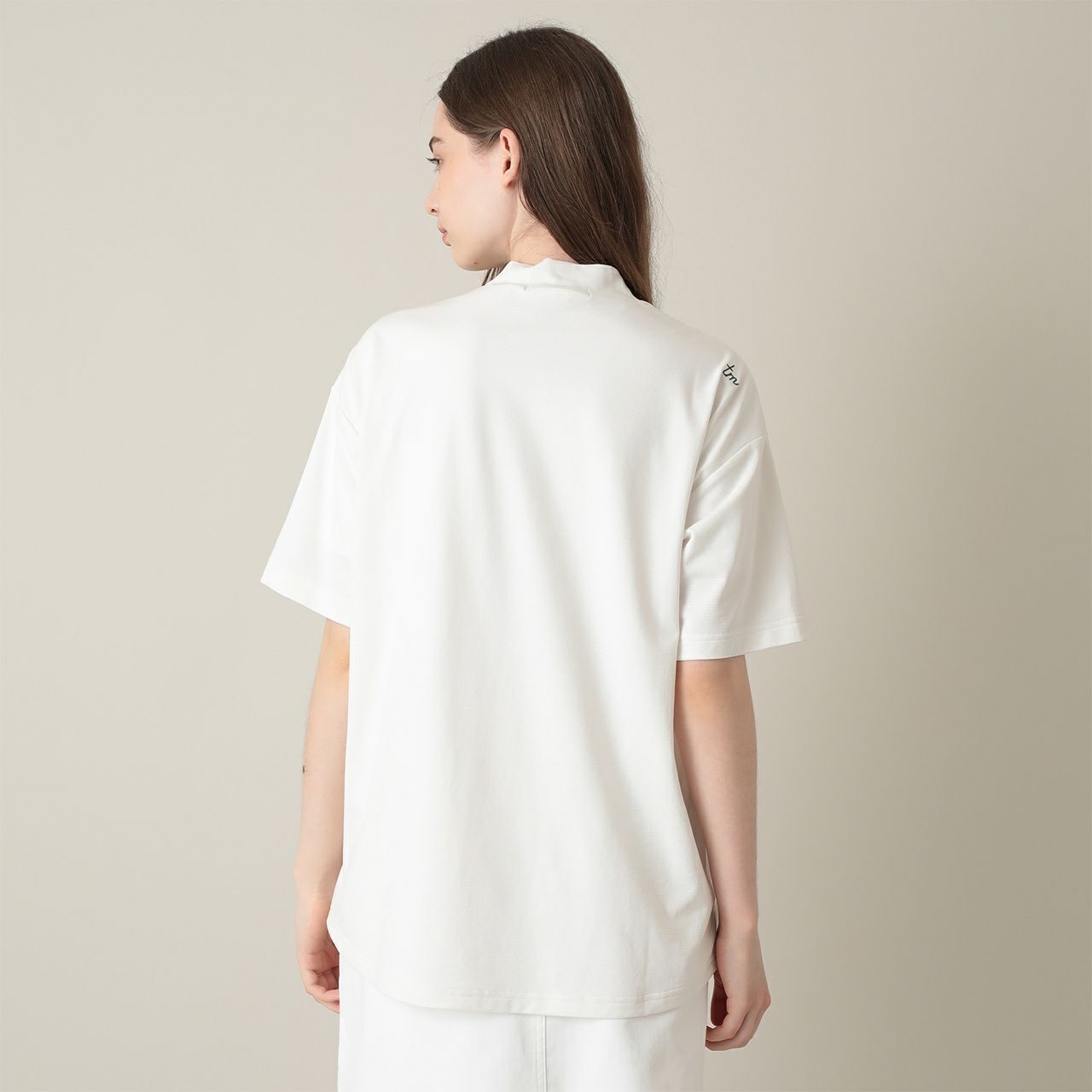 トラヴィスマシューのハイネックシャツ