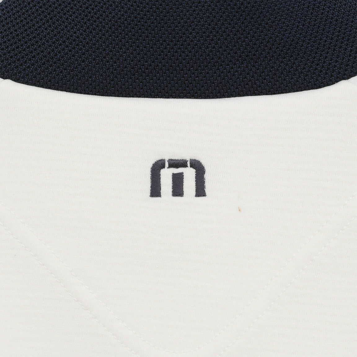 トラヴィスマシューのハイネックシャツ