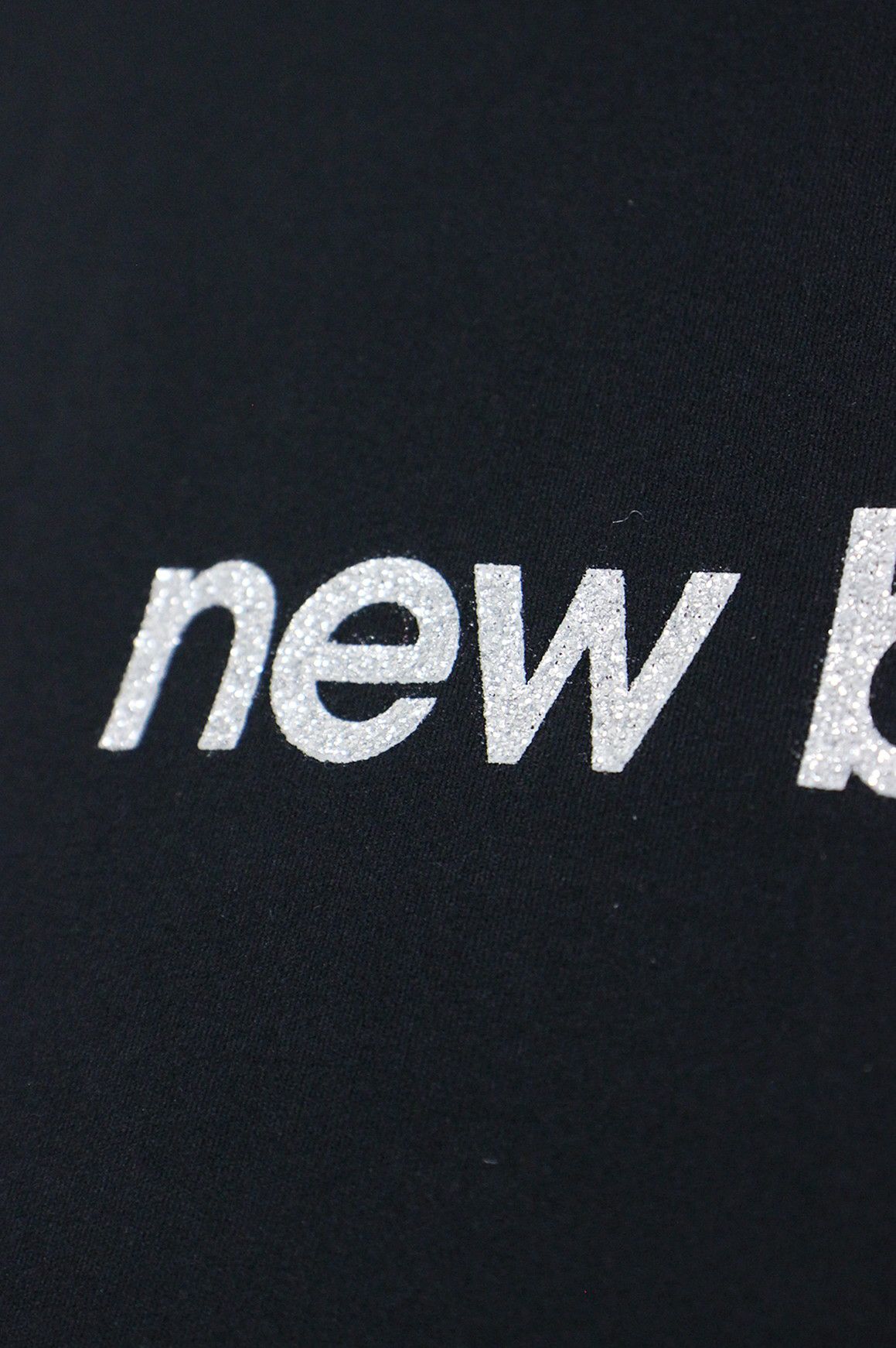 ニューバランスゴルフのハイネックシャツ