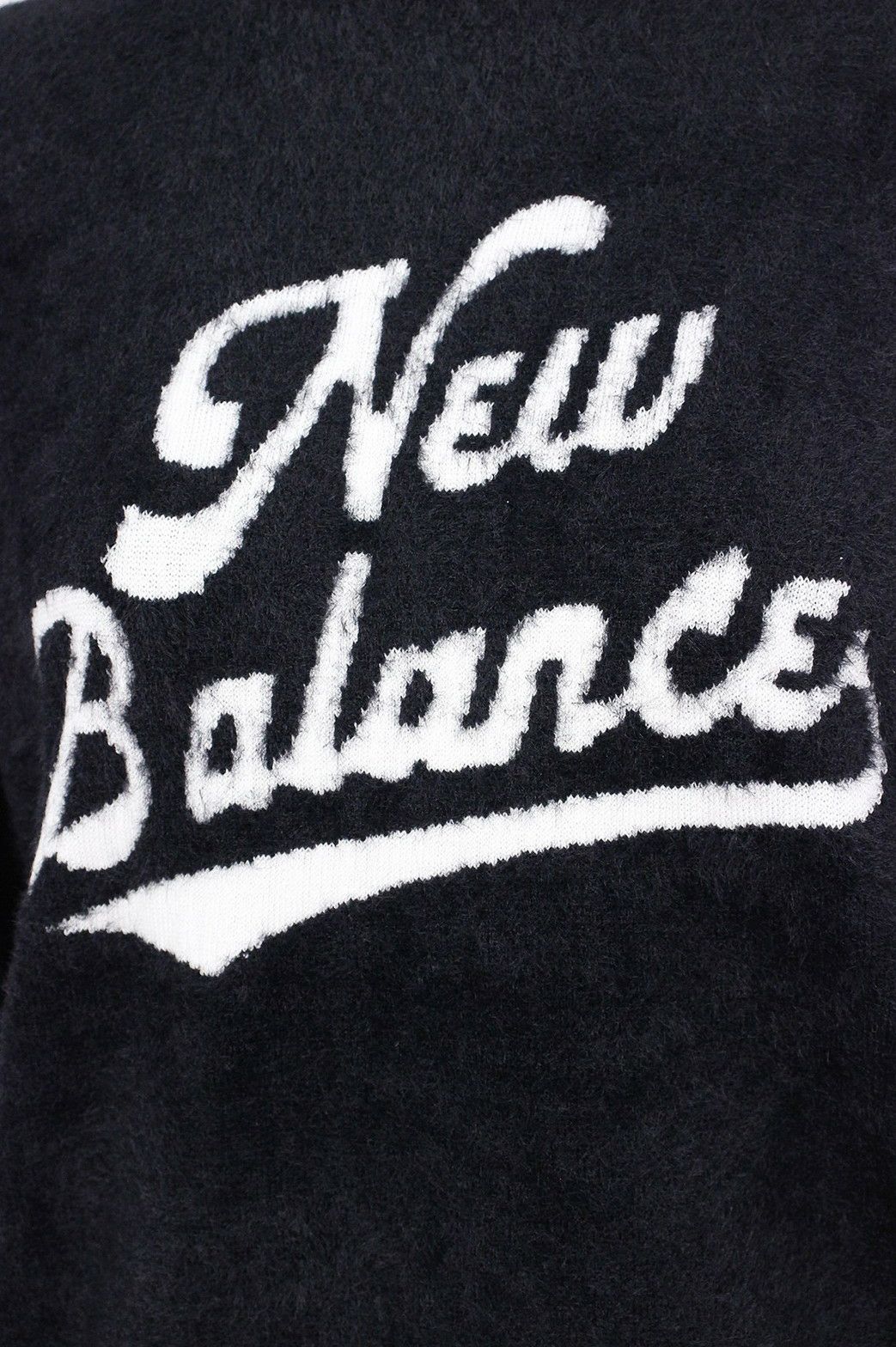 ニューバランスゴルフのセーター