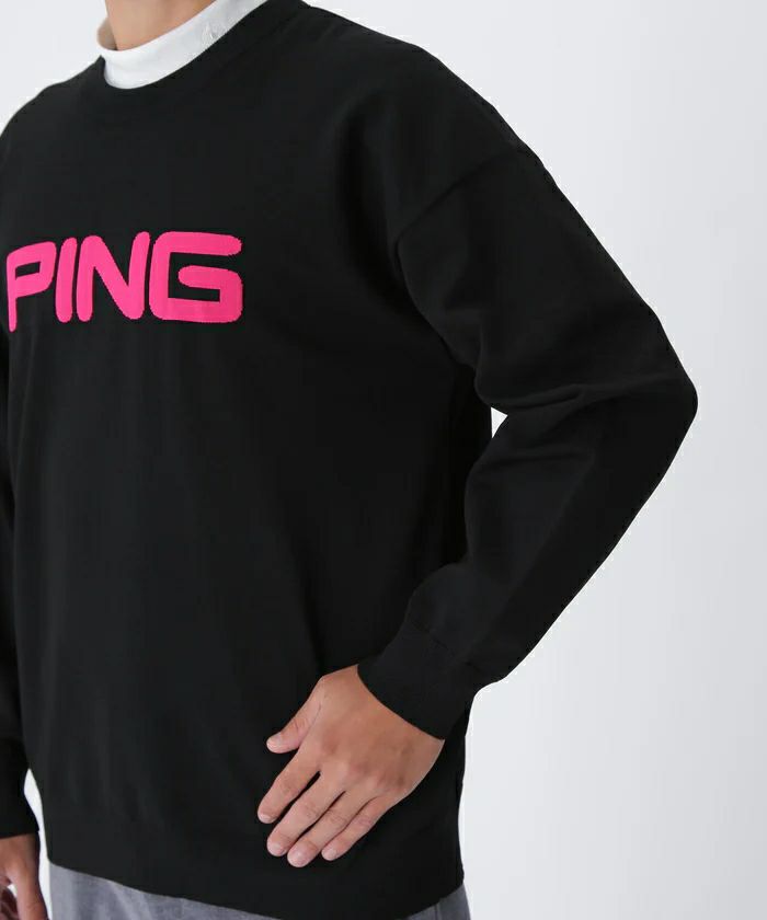 ピンのセーター