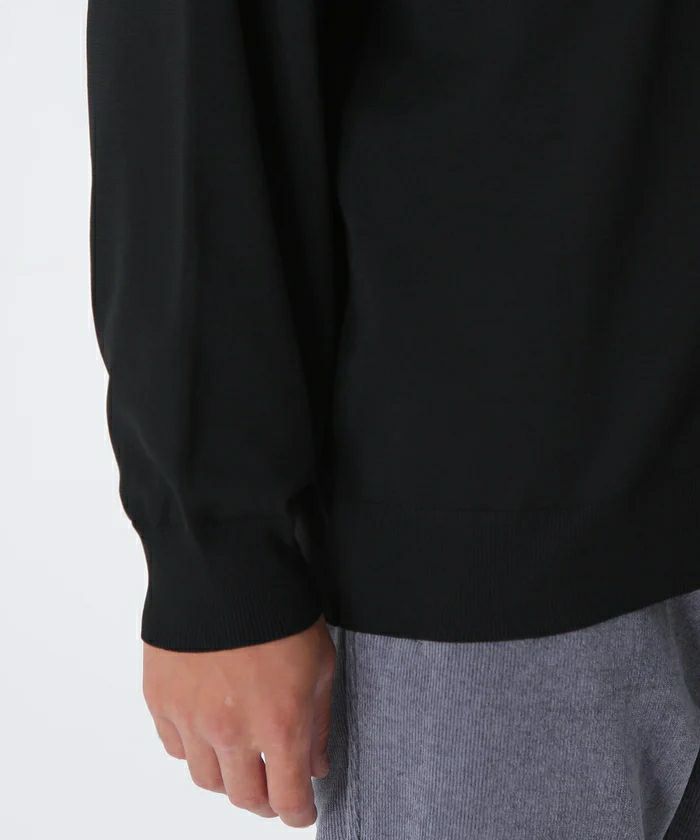 ピンのセーター