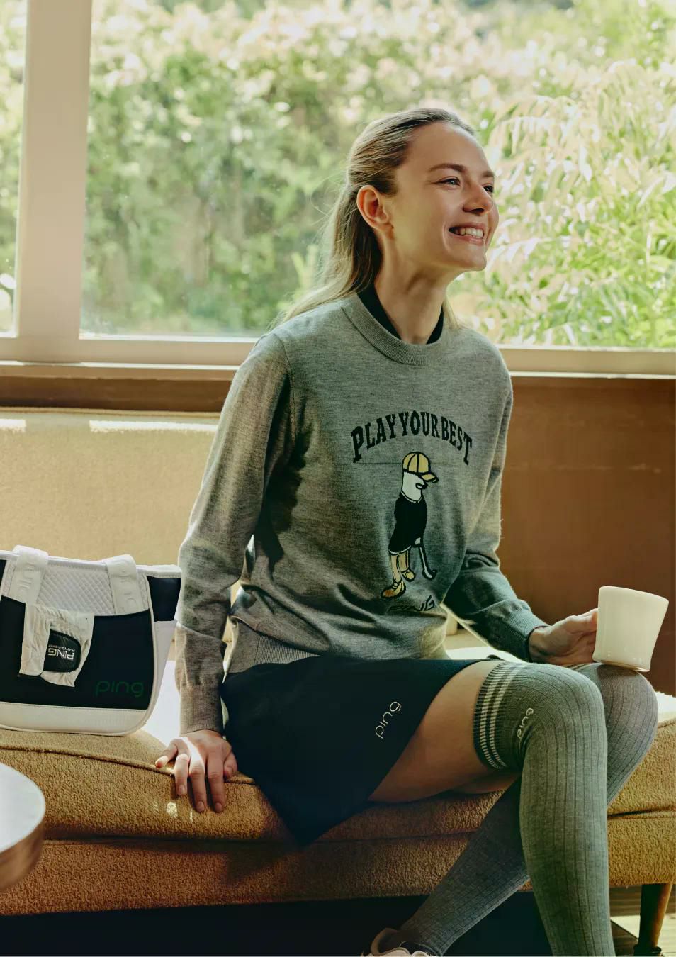 ピンのセーター