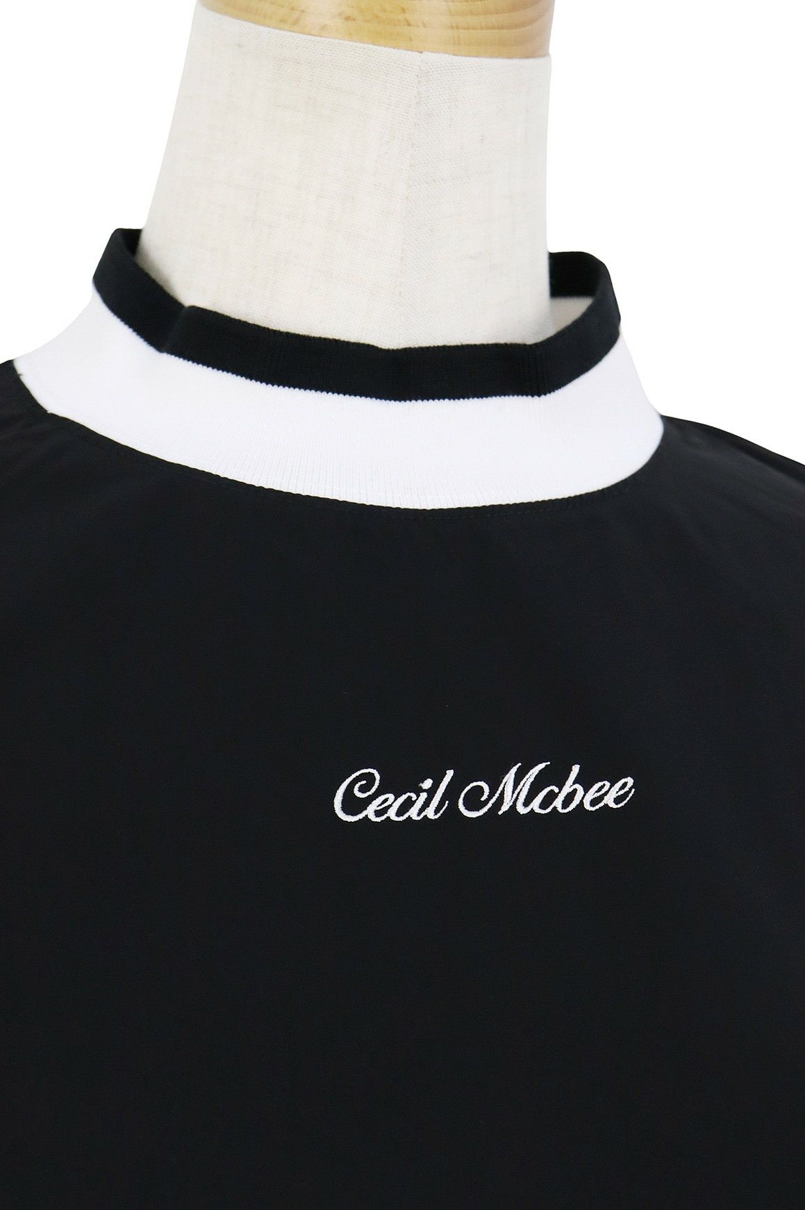 セシルマクビーのハイネックシャツ