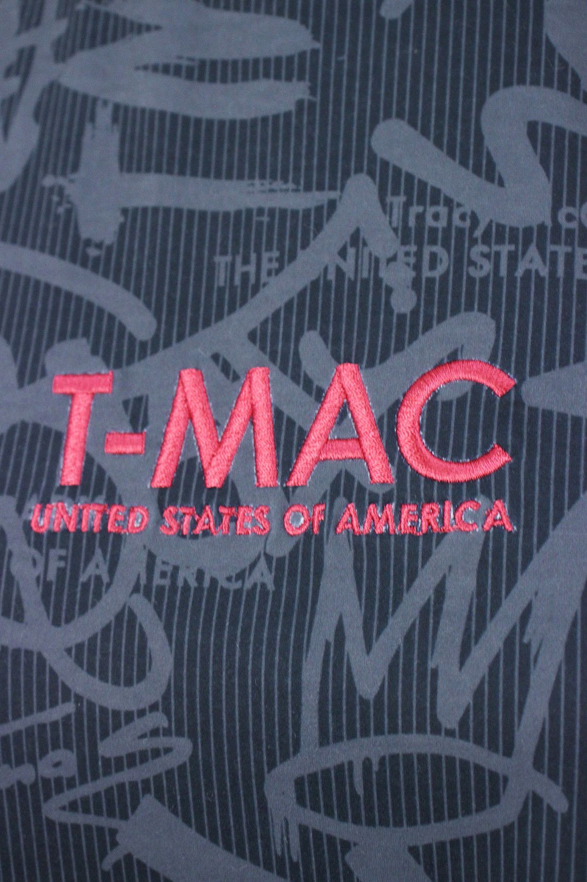 ティーマックのハイネックシャツ