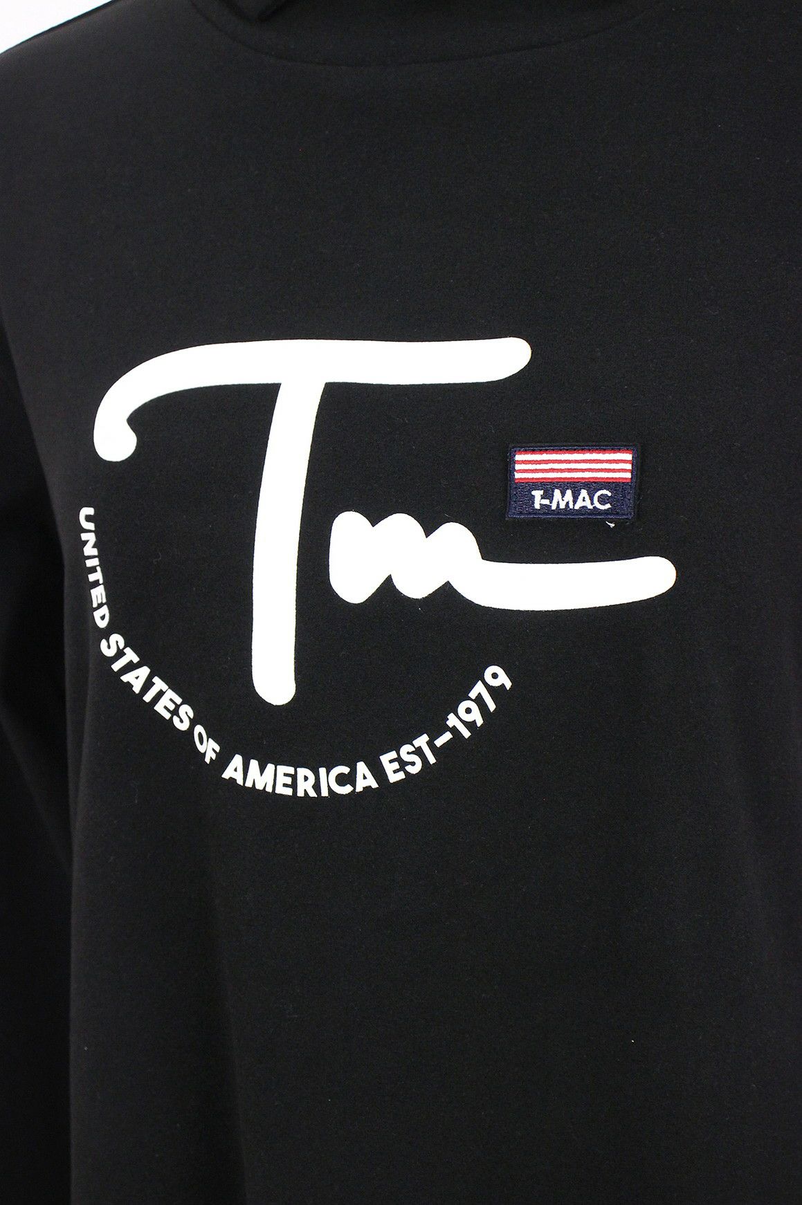 ティーマックのハイネックシャツ