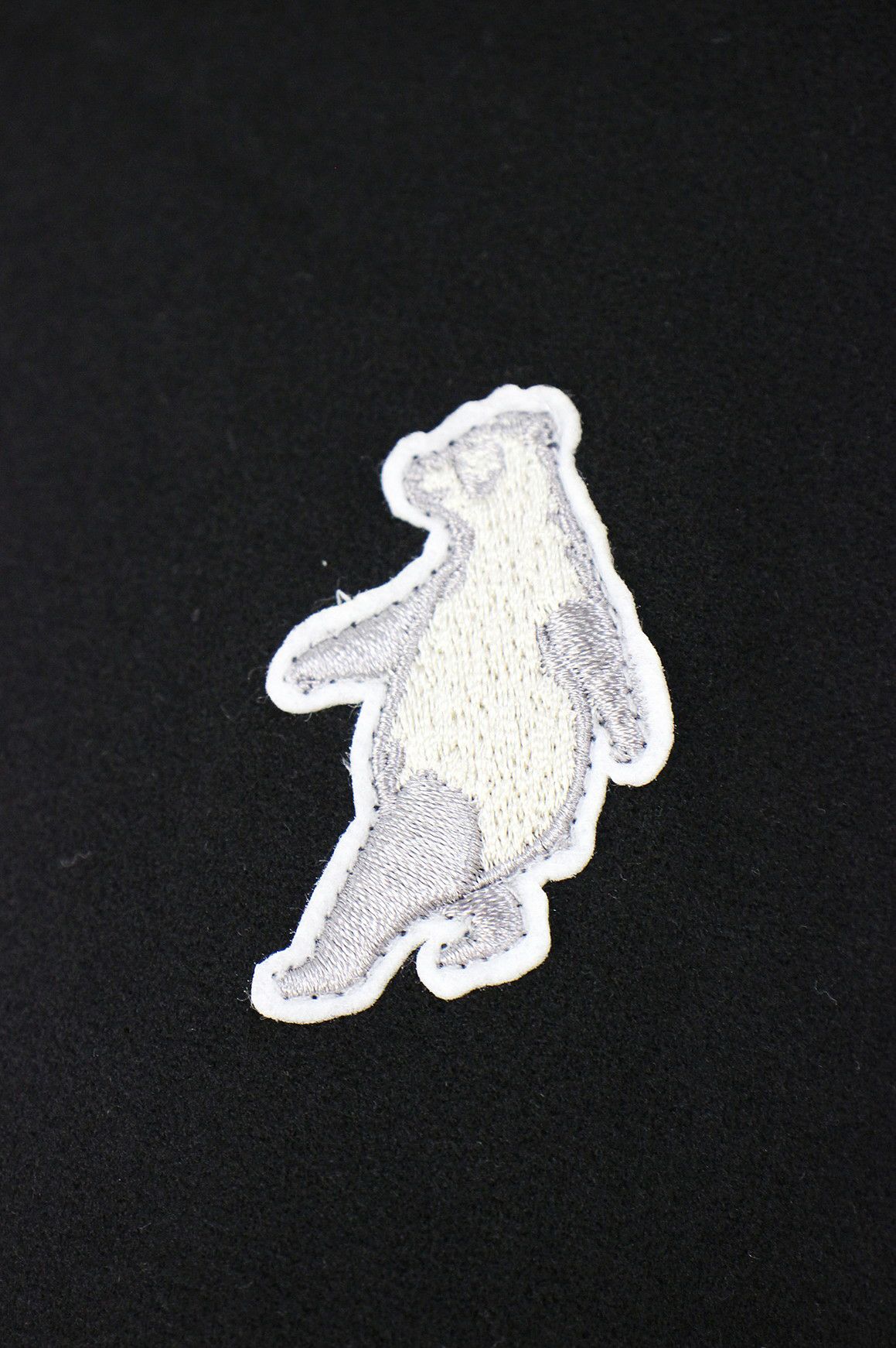 ティーマックのハイネックシャツ