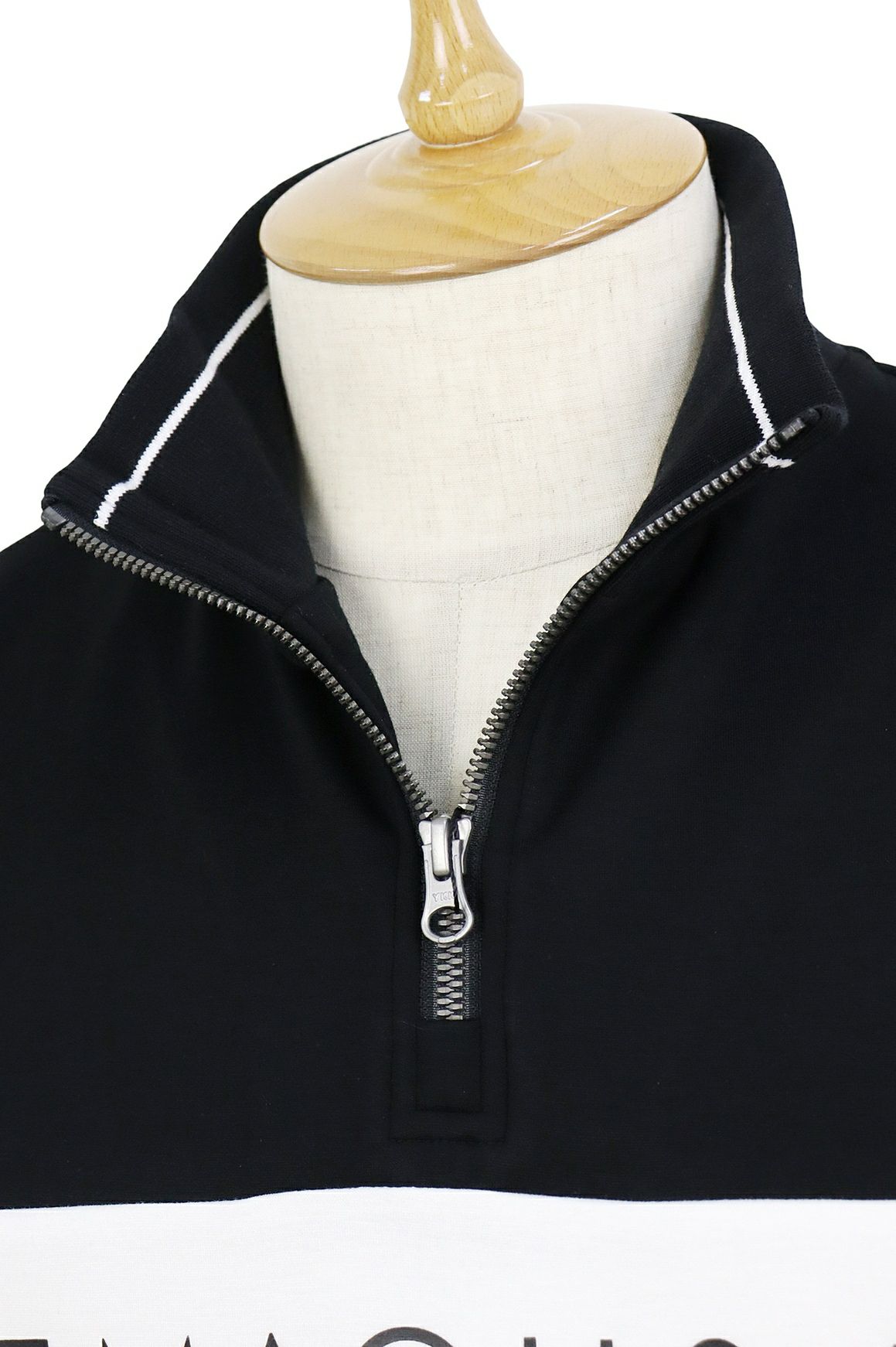 ティーマックのポロシャツ