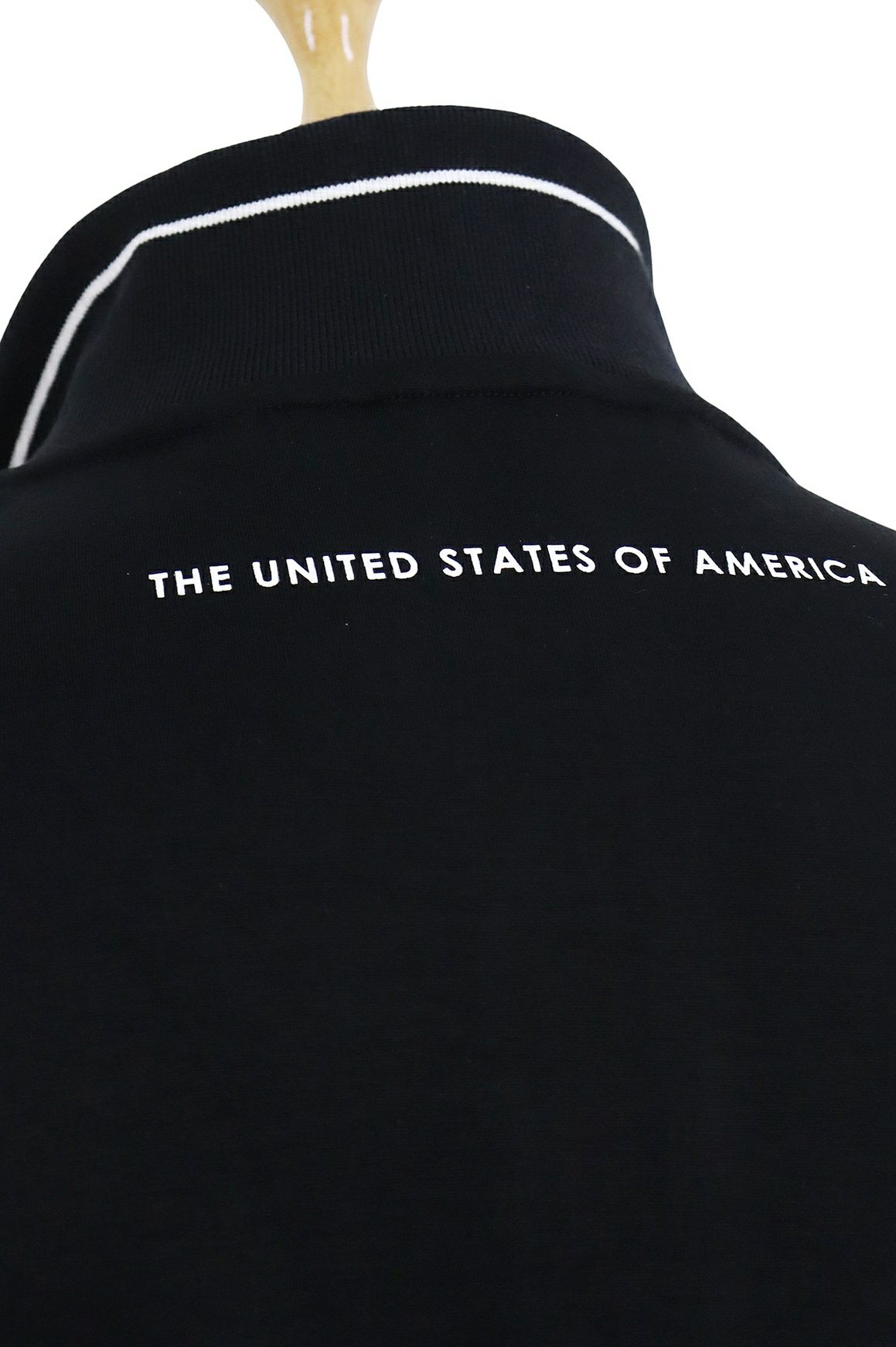 ティーマックのポロシャツ