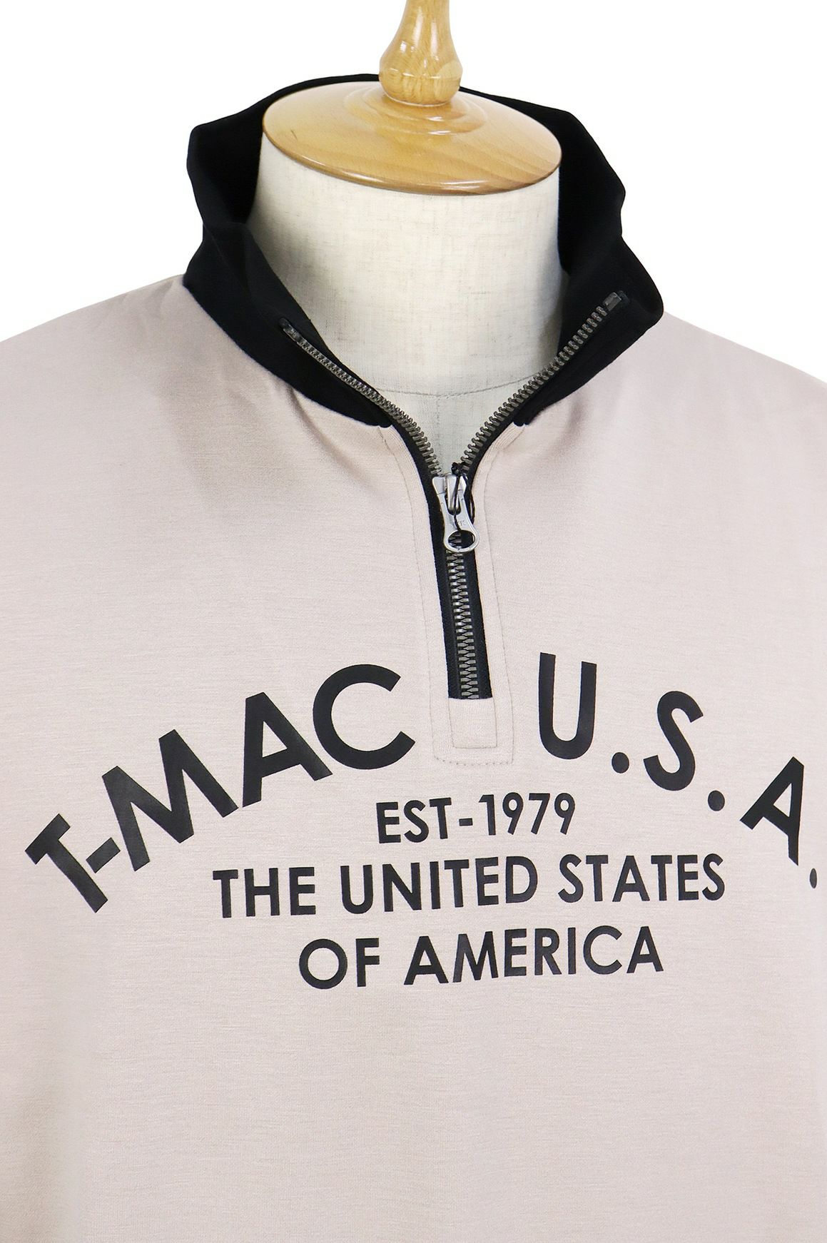 ティーマックのポロシャツ