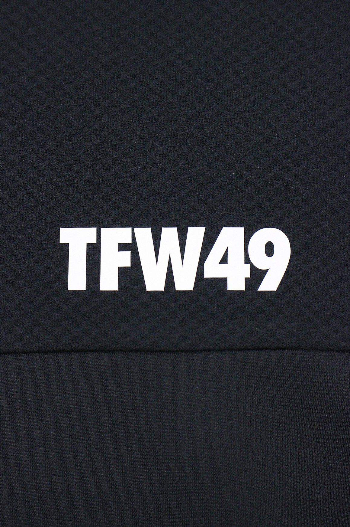 ティーエフダブリューフォーティーナイのポロシャツ