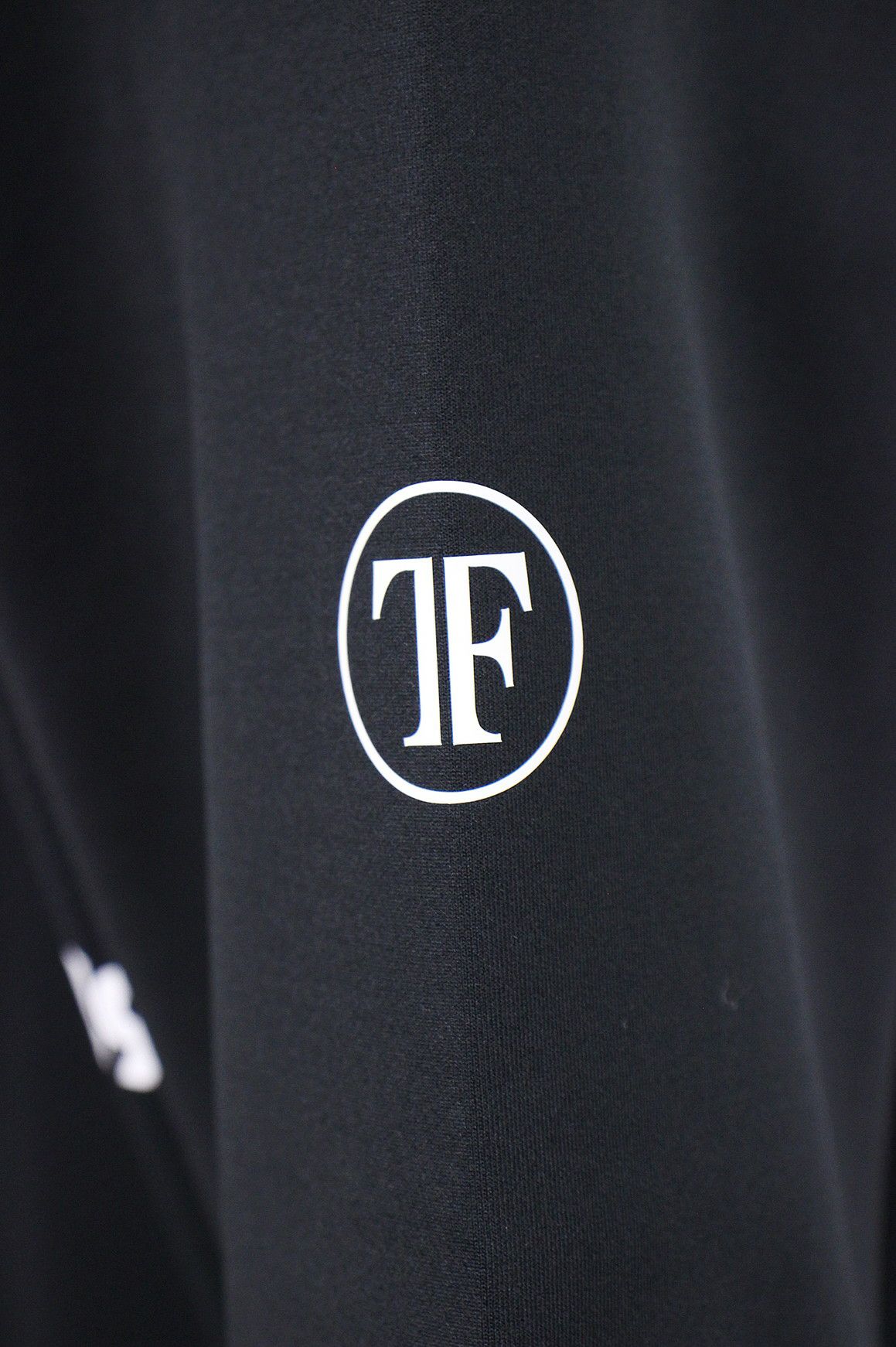 ティーエフダブリューフォーティーナイのポロシャツ