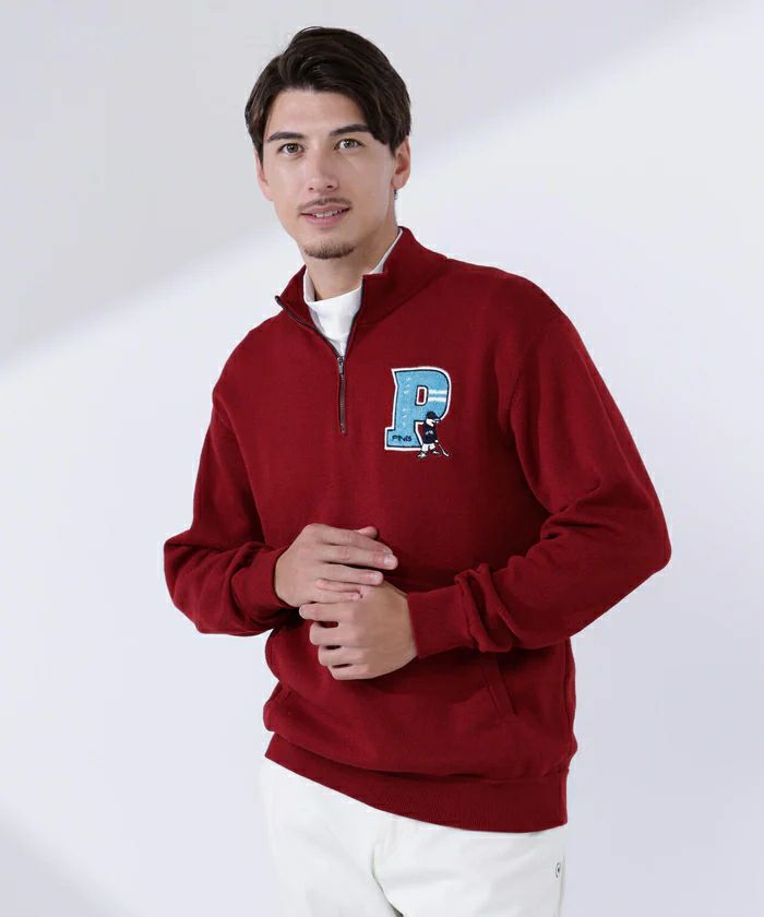 ピンのセーター