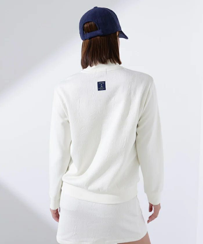 ピンのポロシャツ