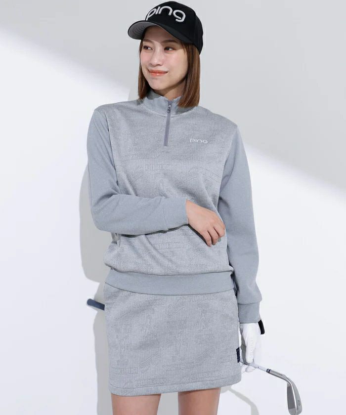 ピンのポロシャツ