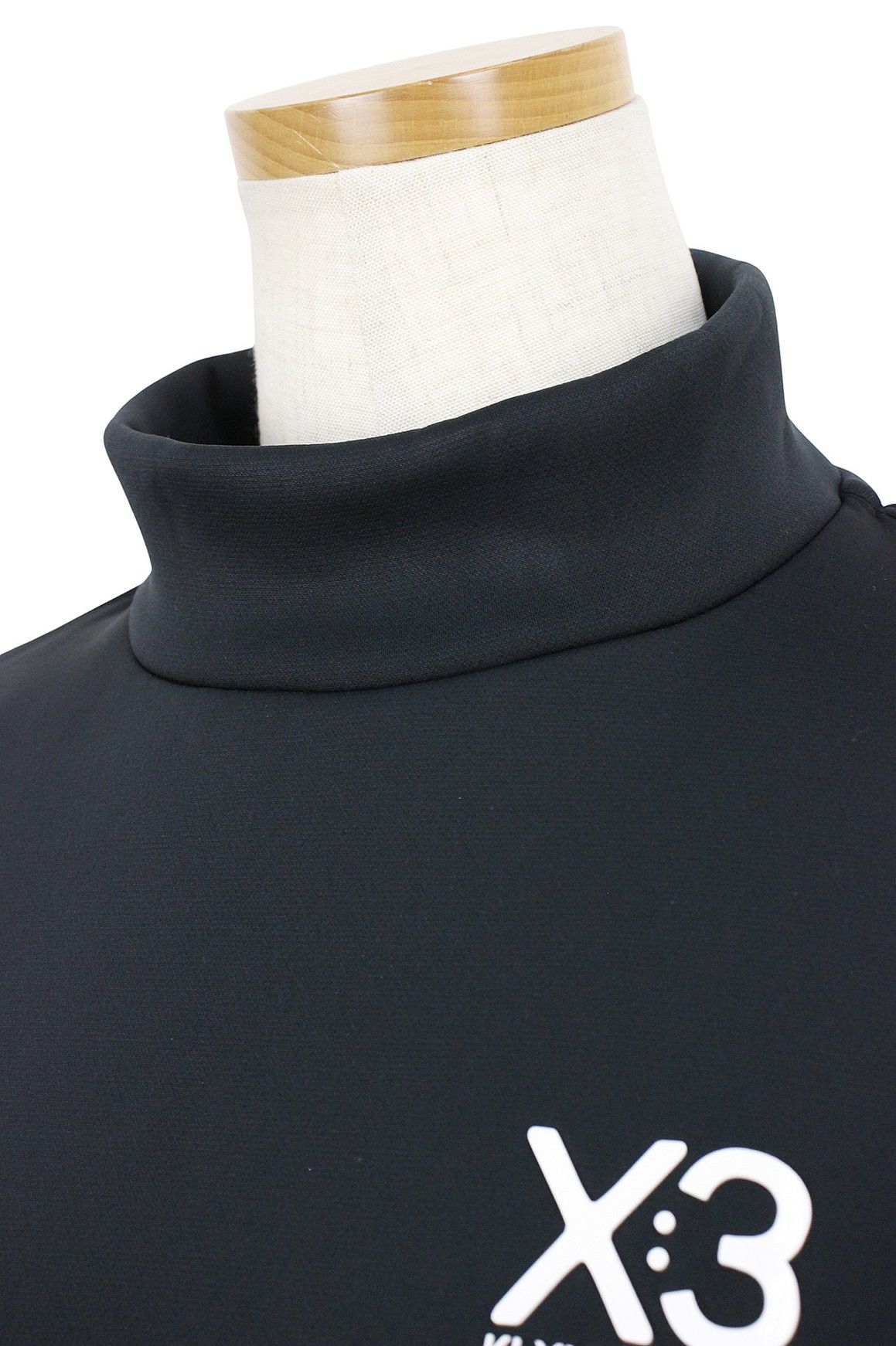 キックスリーのハイネックシャツ